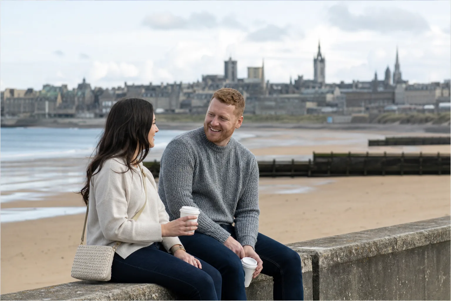 Two people talking over coffee in central Aberdeen